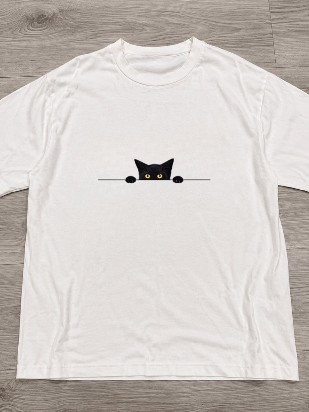 Unbranded White T-Shirt with Black Cat Peek Design Size M